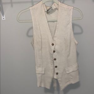 Plunging cream colored button down blouse